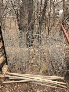 lot 75 image: Garden Oak Stakes, Four Tomato Cages, Chicken Wire