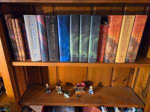lot 298 image: Collection of Harry Potter Figurines & Books