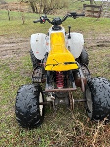 lot 4 image: Yellow Polaris Trail Blazer 2x4 as is was In A Barn for years  no registration