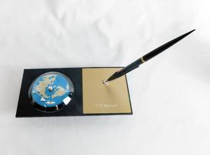 lot 29 image: MCM Astronaut Mercury Space Capusule Desk Pen in Brown & Bigelow Salesman Sample Box