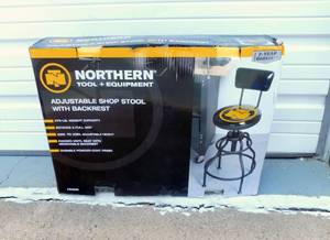 lot 4 image: New In Box Northern Tool  Equipment Adjustable Shop Stool With Backrest