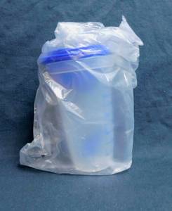lot 28 image: New Tupperware Quick Shake Gravy Shaker