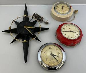 lot 38 image: Misc. Vintage Wall Clocks (WITH CORDS) Star Clock Has One Tip Broken