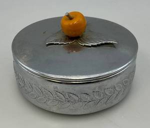 lot 61 image: Art Deco Era Chase Aluminum Covered Powder Dish With Bakelite Apple Handle