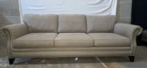 Tan upholstered couch