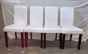 White upholstered dining room chairs
