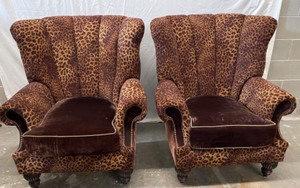 Cheetah print wing back chairs.