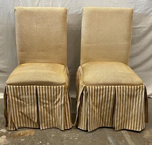 Mustard yellow, cream upholstered dining room chairs.