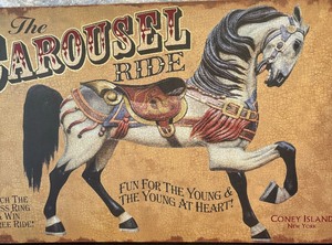 lot 144 image: The Carousel Ride Tin Sign