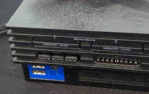 lot 56 image: PlayStation 2 Game Console and Controllers