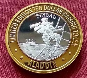 lot 10 image: Las Vegas Aladdin Hotel Silver Strike Token - Sinbad