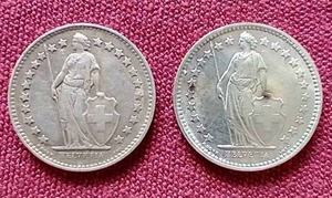 lot 34 image: (2) Switzerland Silver 12 Franc Coins