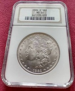 lot 55 image: 1884-O Morgan Dollar - NGC MS64