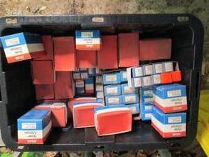 Heavy Duty Storage Tote full of assorted Atlas Ignition parts, flashers and hose clamps