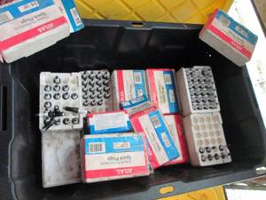 Heavy Duty Storage Tote with assorted cases of Atlas Copper Performance Spark Plugs