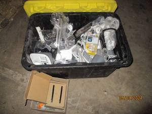 Covered tote of lights and other items