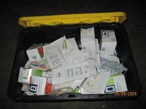Covered tote full of outlet covers