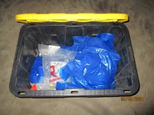 Covered tote of clips and trash bags