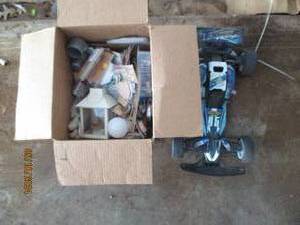 Box of lighting hardware and a toy car