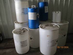 Large lot of empty plastic barrels...