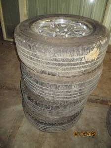 4 Tires and rims, 266 65 R18...