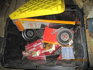 Covered tote full of automotive supplies