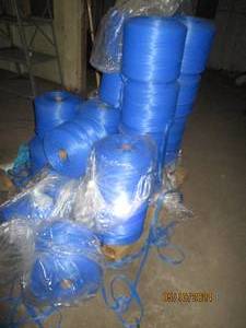many rolls of blue mesh, expands out and could be tied off to make bags