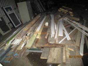 Bring a trailer HUGE VALUE pile of limber, trim boards and metal wall studs.
