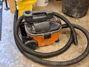 lot 69 image: Ridgid 4-Gallon Portable Shop Vacuum with Hose