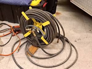 lot 145 image: Air Hose with Hose Reel