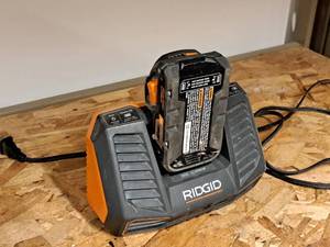 lot 176 image: Ridgid 110W 9.6-18V Class 2 Battery Charger R840095 with Hyper Lithium Ion 18V Battery