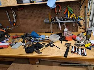 lot 221 image: Lot of  Assorted Hand Tools - Stapler and Staples, Claw Hammer, Sledgehammer, Wrench Set, Sockets and Extensions, Flashlight, Drill Bits, Screwdrivers, Pliers, Scissors and much more