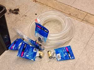 lot 243 image: (2) Reels of Plastic Tubing 34 I.D. x 1.0 O.D. x 10L (5) Brass Quick Connect Couplings