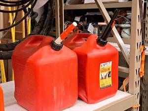 lot 244 image: Lot of (2) 5-Gallon Plastic Gas Cans