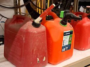 lot 245 image: Lot of (2) 5-Gallon Plastic Gas Cans