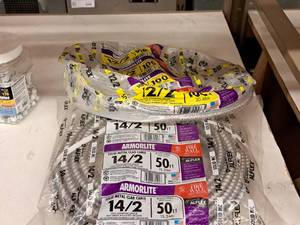 lot 247 image: (1 Full) Pack of 142 Solid Clad Cable 50, (1 Partial) Pack 122 Cable (length unknown)