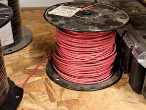 lot 259 image: Lot of (1) 600V Partial Spool of Red 12 Solid Copper Wire