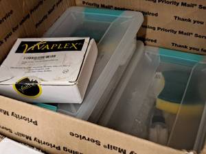 lot 275 image: (3) Totes w LubricatinbgCleaning Kits and (1) Box of 2ml Clear Glass Bottles with Caps