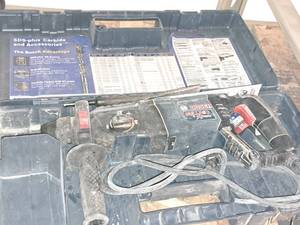 lot 330 image: Bosch Hammer Drill 11255VSR with Case and Bits