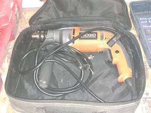 lot 332 image: Ridgid 12 Drill R7111 with Case