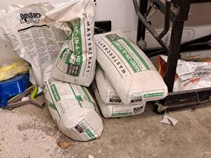 lot 393 image: Mastercraft Sand-In-A-Tube (4) Full 70lb Bags of Sand  (1) Partial Bag of Sand