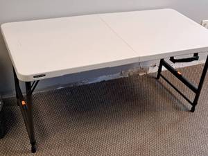 lot 639 image: Lifetime Portable Folding Table with Extra Legs