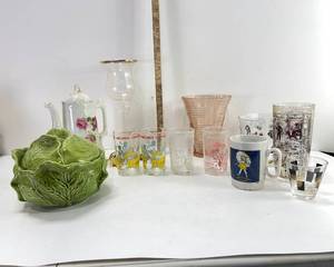 lot 35 image: ARCHIES AND FLINTSTONE JELLY GLASSES CABBAGE BOWL MORTON ADVERTISING MUG PINK VASE AND MORE