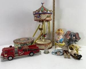 lot 49 image: BANK, ELEPHANT, HESS BATTERY FIRE TRUCK, WIND CHIME CAROUSEL AND MORE