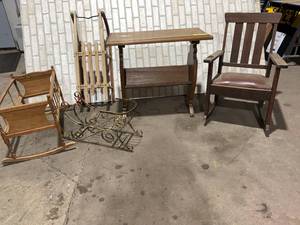 lot 82A image: ANTIQUE WOOD CUSHION ROCK CHAIR, CRADEL, BOOK TABLE, WOOD SLED, METAL DECORATIVE SLED LOT