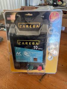 lot 88 image: NIB Zareba Electric Fence Controller