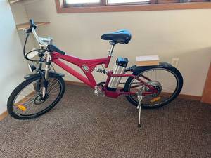 lot 552 image: NOS Red Electric Bike with Charger & Battery