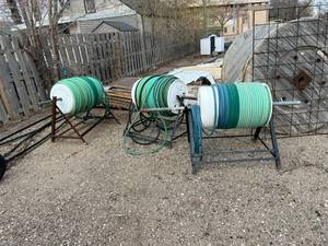 lot 565 image: 3 Large Reels of Garden Hose on Steel Stands