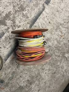 lot 619 image: Roll of Extension Cords - 300 Total Feet