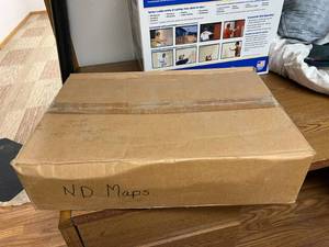 lot 708 image: Full Case (24) NOS ND Centennial Map Puzzles